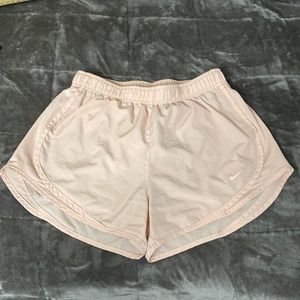 Pink Nike shorts, size small